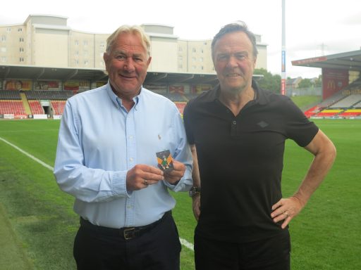 Alan Rough receives his Thistle Pin from TJF director Derek McLeish